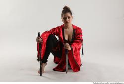 Katerina Ninja Kneeling Pose
